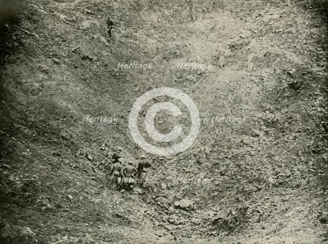 'A Mine Crater in High Wood', (1919).  Creator: Unknown.