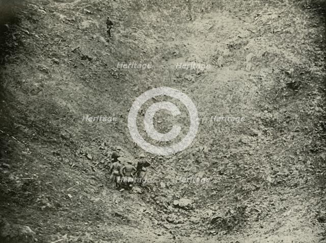 'A Mine Crater in High Wood', (1919).  Creator: Unknown.