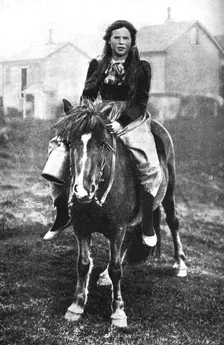 A milkmaid on her morning round, Iceland, 1922