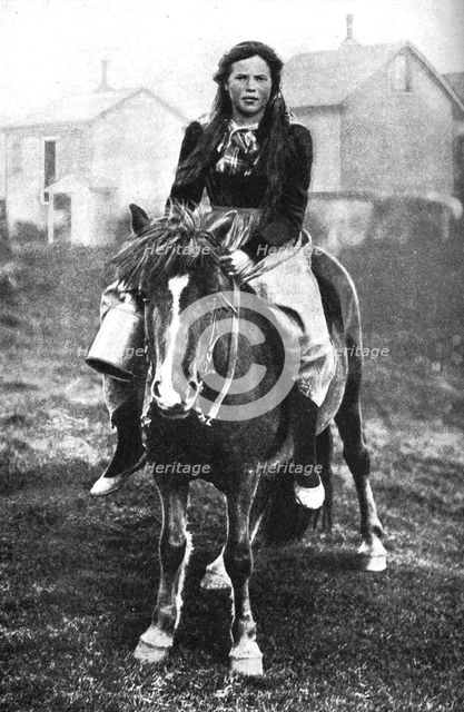A milkmaid on her morning round, Iceland, 1922. Artist: Unknown