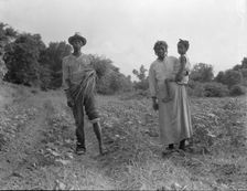 A Mississippi Negro family who live on a cotton patch near Vicksburg, 1936. Creator: Dorothea Lange