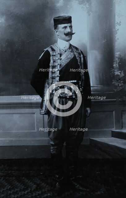 A Montenegrin man wearing national dress and a Montenegrin cap. Creator: Unknown.