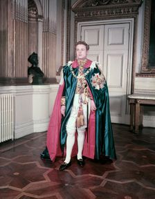 A model wearing the mantle and insignia of the Order of St Michael and St George, c1950s. Creator: Arthur Charles Kirby Ware