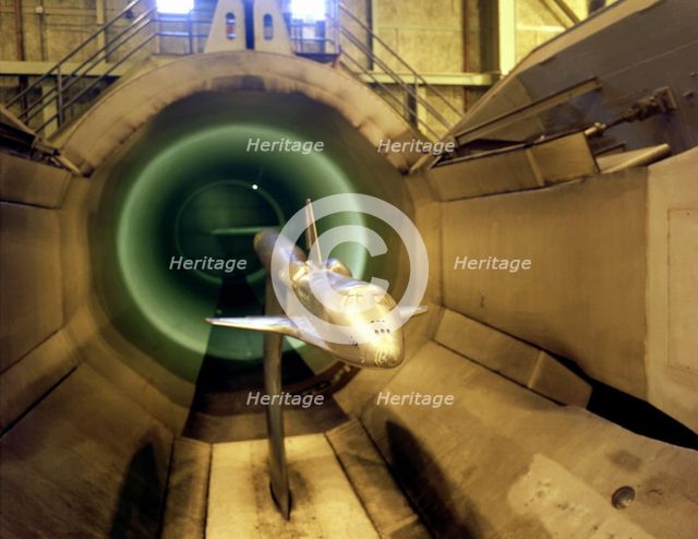 A model of the Space Shuttle Orbiter in the 16-Foot Transonic Tunnel, USA, ca. 1978.  Creator: NASA.