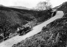 A Morris Oxford climbing a steep hill in the Lake District, Cumbria, (c1920s?)