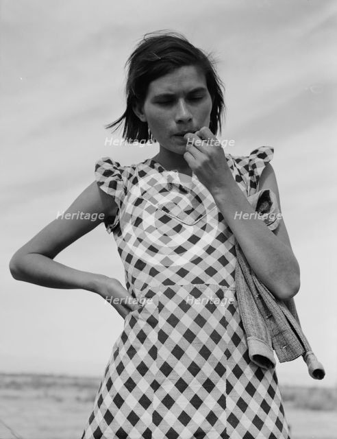 A mother in California who with her family will be returned to Oklahoma by the Relief..., 1937. Creator: Dorothea Lange.