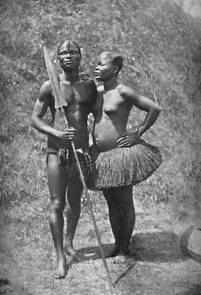 A Mulolo (Congo) warrior and his wife from the central Congo regions, 1902