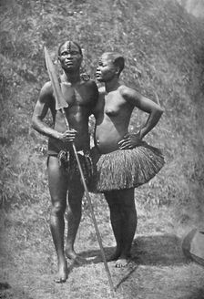 A Mulolo (Congo) warrior and his wife from the central Congo regions, 1902