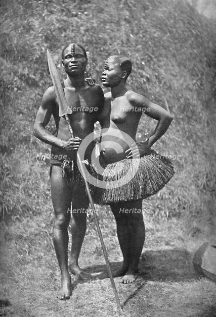 A Mulolo (Congo) warrior and his wife from the central Congo regions, 1902. Artist: Unknown.