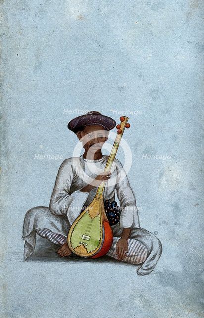 A musician holding a sitar, (between 1800 and 1899?). Creator: Unknown.