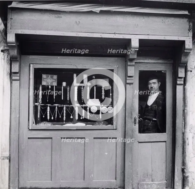 A Muslim merchant, Bosnia-Hercegovina, Yugoslavia, 1939. Creator: Unknown.