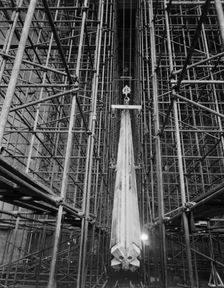 A nave column being hoisted into position during the construction of Coventry Cathedral, 1959. Creator: John Laing plc