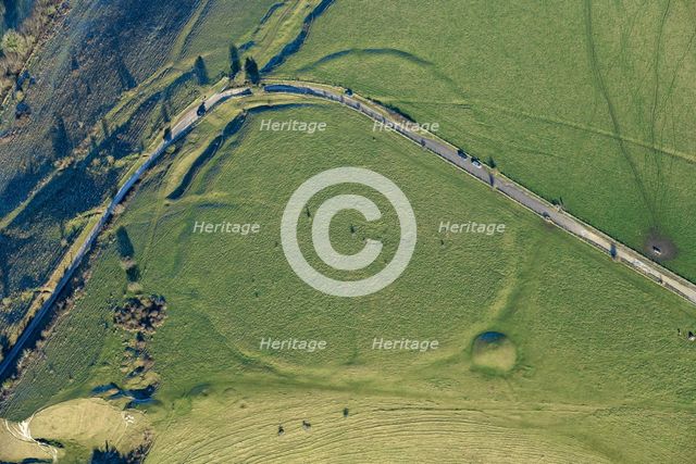 A Neolithic camp or causewayed enclosure earthwork, and bowl barrow earthworks on White..., 2023. Creator: Damian Grady.