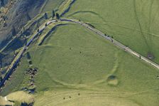 A Neolithic camp or causewayed enclosure earthwork, and bowl barrow earthworks on White..., 2023. Creator: Damian Grady