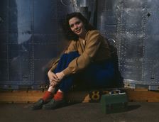 A noontime rest for a full-fledged assembly worker...Long Beach, Calif. Plant of Douglas..., 1942. Creator: Alfred T Palmer