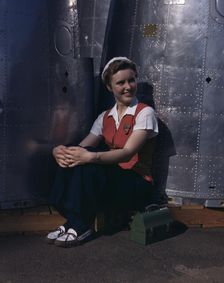 A noontime rest for a full-fledged...Long Beach, Calif., plant of Douglas Aircraft Company, 1942. Creator: Alfred T Palmer