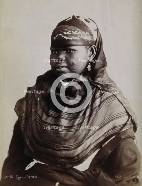 A North African woman with scarification on her cheeks, c1900. Creator: Gabriel Lekegian.