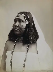 A North African woman with scarification on her cheeks, c1900. Creator: Gabriel Lekegian