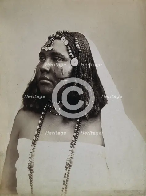 A North African woman with scarification on her cheeks, c1900. Creator: Gabriel Lekegian.