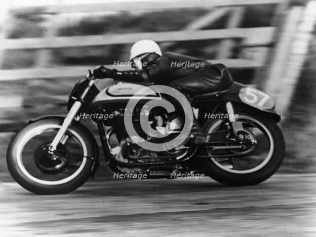 A Norton in action in the Isle of Man TT, 1950. Artist: Unknown