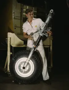 A nose wheel and landing gear assembly for a B-25..., North American Aviation, Inc., Calif., 1942. Creator: Alfred T Palmer