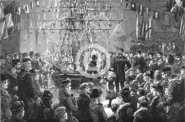 ''A Novel Treat to Coastguards Children; Dismantling a Christmas "Ship" of her toys', 1890. Creator: Fred Palmer.