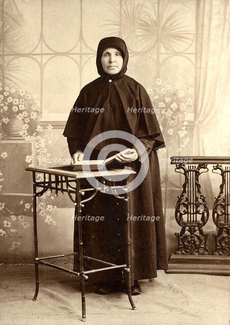 A Nun of Pomorskii-Pocrovskii Convent on the Upper Reaches of the Uba River, 1910. Creator: Unknown.