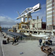 A nuclear submarine berthing at Devonport docks, Plymouth, Devon, 1980. Creator: Michael Walters