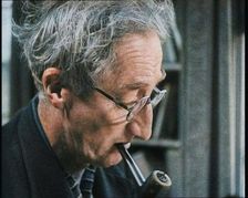 A.P. Herbert Smoking a Pipe, 1930s. Creator: British Pathe Ltd