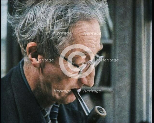 A.P. Herbert Smoking a Pipe, 1930s. Creator: British Pathe Ltd.
