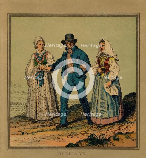 A panel, image of a man who is out for a walk with a woman on each side. (c1900s). Creator: Unknown.