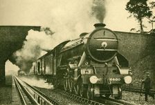 A "Pacific" Engine Picking Up Water at the Rate of 2,500 Gallons in Ten Seconds - London and North Creator: Unknown