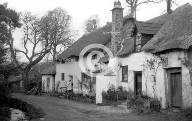 A pair of cottages with thatched roofs at Luccombe, Somerset, c1900.   Artist: Farnham Maxwell Lyte