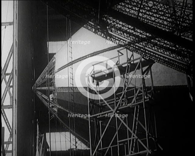 A Partially Constructed R 38 Airship Sitting in a Hangar, 1921. Creator: British Pathe Ltd.