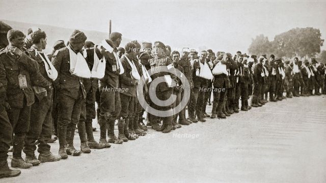 A parade of the walking wounded, Somme campaign, France, World War I, 1916. Artist: Unknown