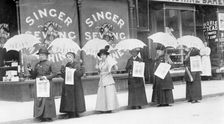 A parasol parade selling The Suffragette newspaper, Brighton, Sussex, 1914