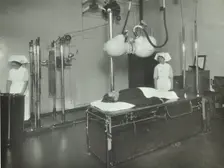 A patient undergoes a medical procedure, c1950s. Creator: Unknown