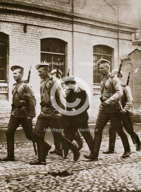A patrol hunting down suspects following the revolt at Vyborg, Russia, early 20th century. Creator: Unknown.