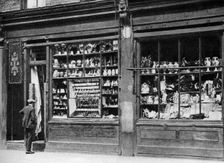 A pawnbroker's shop front, Bow, London, 1926-1927.Artist: Whiffin