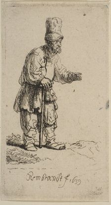 A Peasant in a High Cap, Standing Leaning on a Stick, 1639. Creator: Rembrandt Harmensz van Rijn