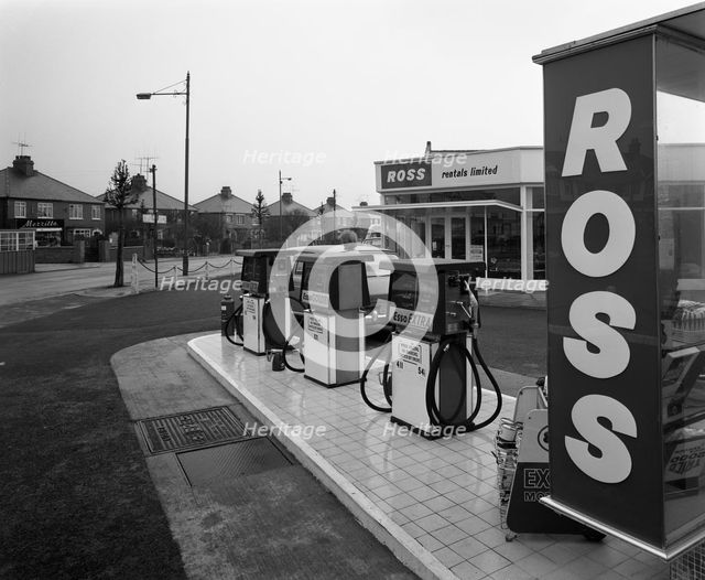 A petrol station forecourt, Grimsby, Lincolnshire, 1965.  Creator: Michael Walters.