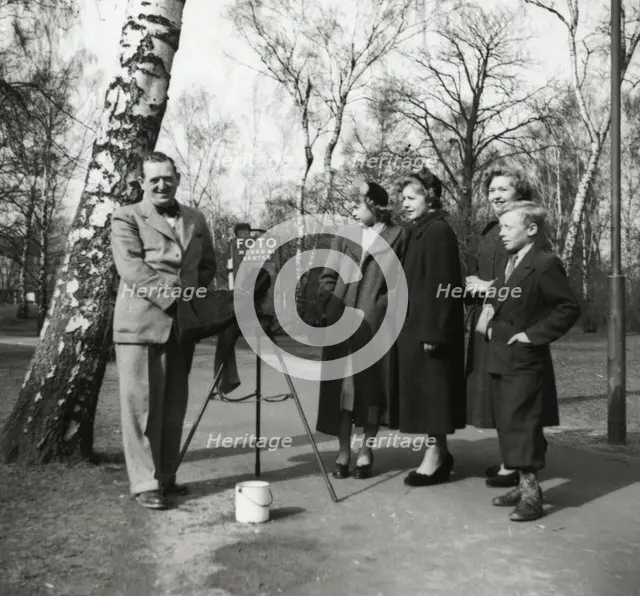 A photographer in a park, Landskrona, Sweden 1952. Creator: Unknown.