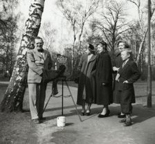 A photographer in a park, Landskrona, Sweden 1952. Creator: Unknown