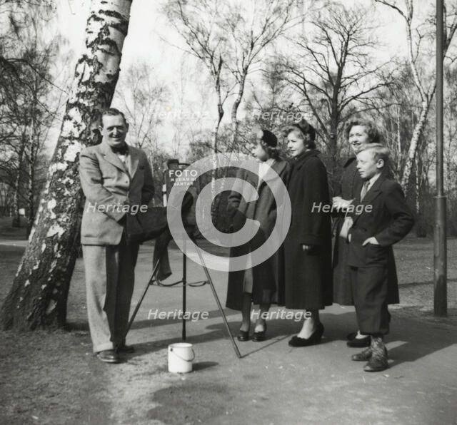 A photographer in a park, Landskrona, Sweden 1952. Artist: Unknown