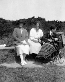 A physically disabled boy sitting in a wheelchair, c1910/1925. Creator: Unknown