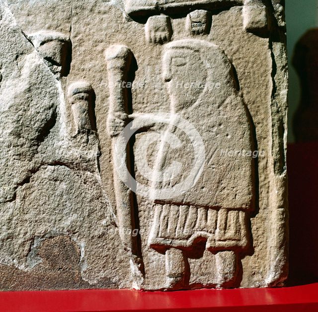 A Pict with hooded cloak & Pictish trousers, St.Vigeans, Scotland, c8th - 9th century. Artist: Unknown