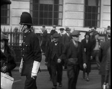 A Police Officer Guiding Traffic on the Streets of London, 1936. Creator: British Pathe Ltd