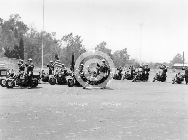 A police patrol with their Harley-Davidsons, America. Artist: Unknown