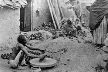 A potter at work, India, 20th century