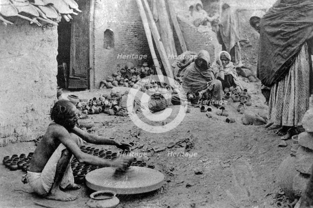 A potter at work, India, 20th century. Artist: Unknown